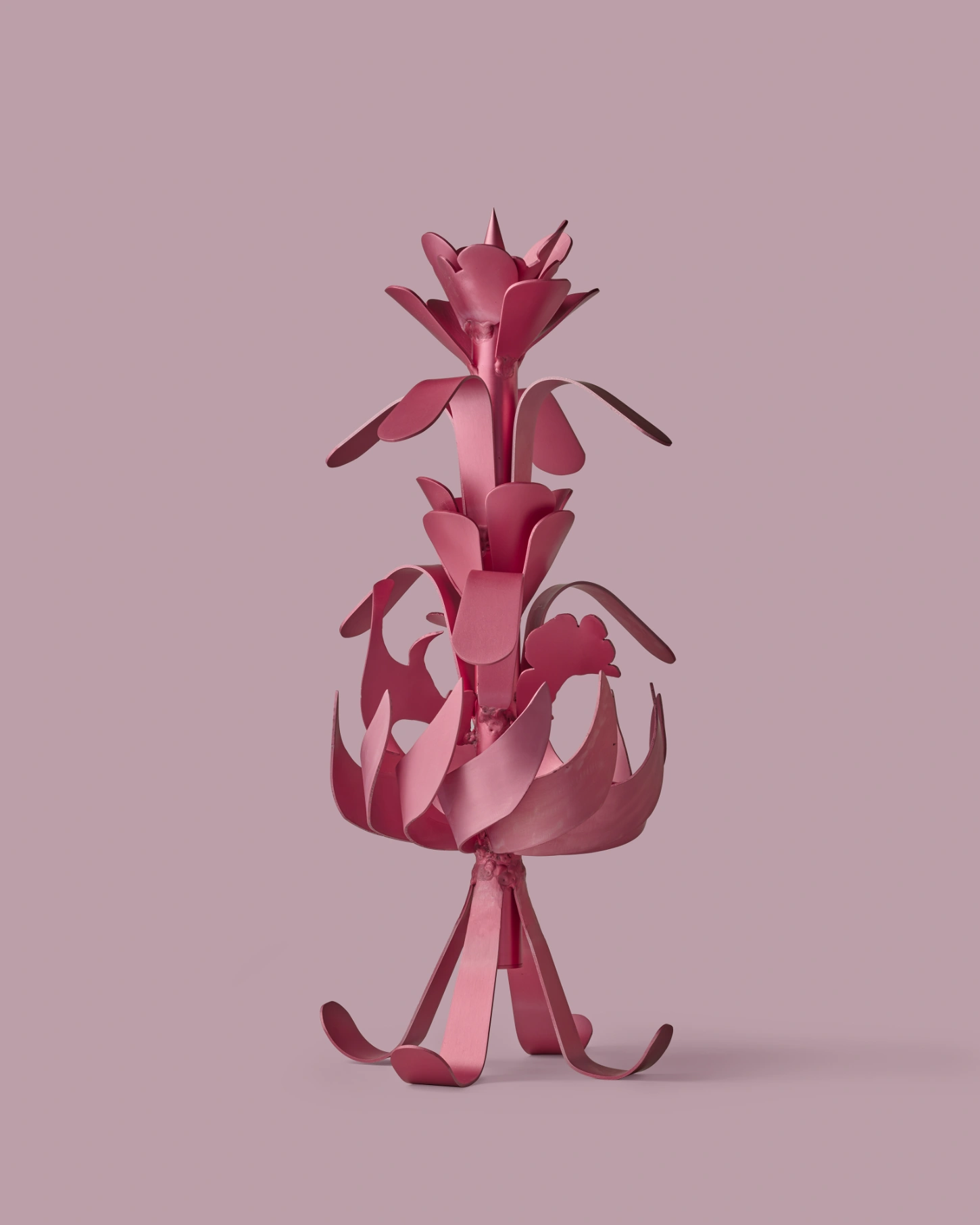PINKDOM by Knit Pigment — A sculptural paper form in hot pink constructed from layered, cut sheets that establish an anthropomorphic figure.