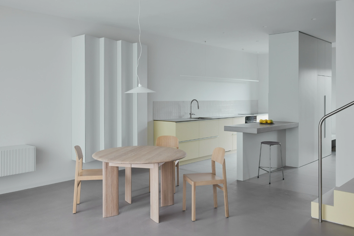 VVV by i.B Archstudio — A light-filled open-plan interior demonstrates spatial flexibility through purposeful material contrast.
