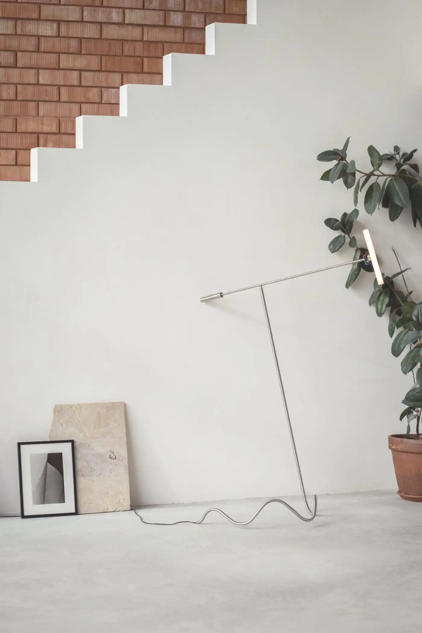 Casa Dosmurs by MESURA — A minimalist interior corner captures architectural detailing at Casa Dosmurs.