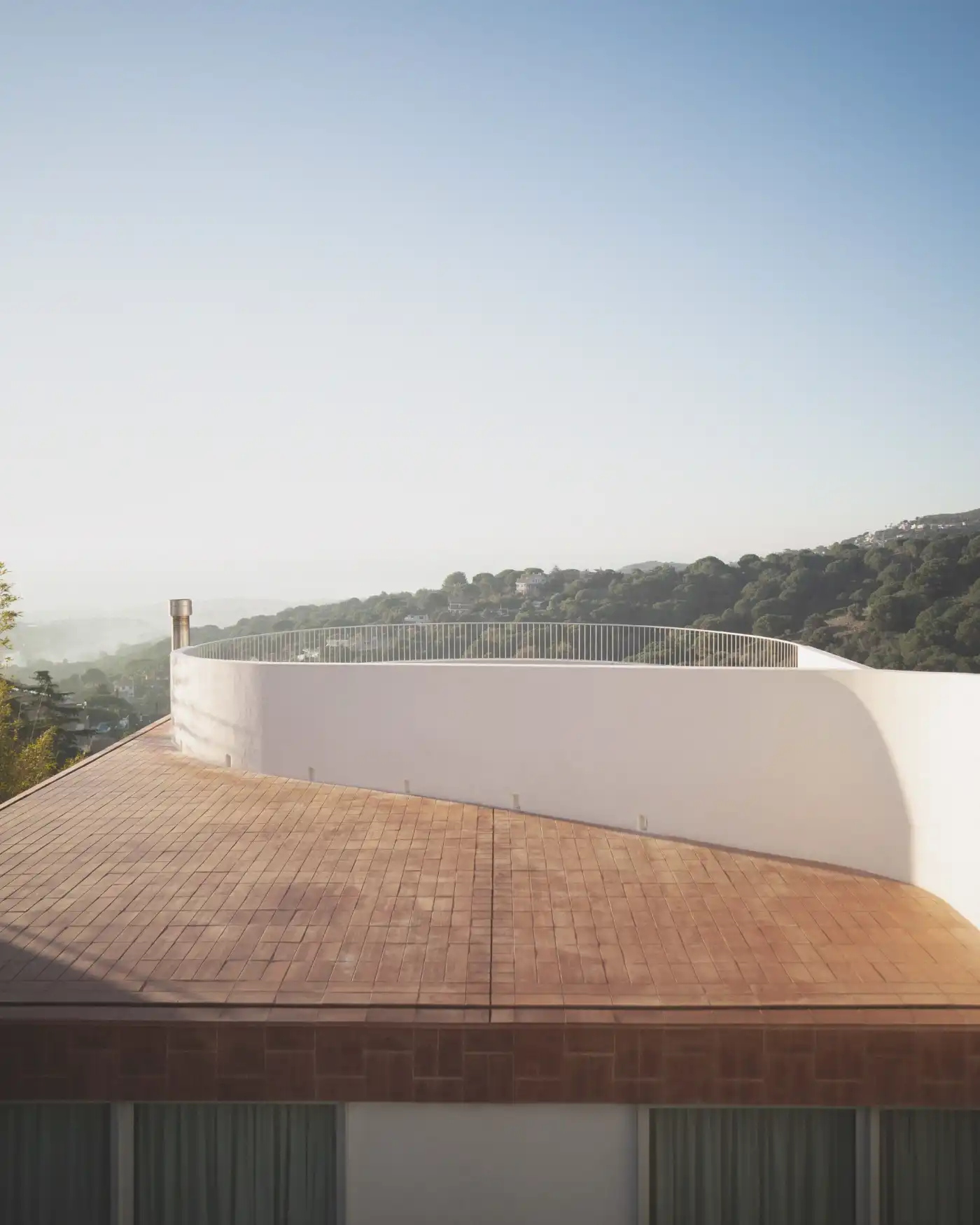Casa Dosmurs by MESURA — Rooftop terrace of Casa Dosmurs showcases the project's deliberate spatial strategy.