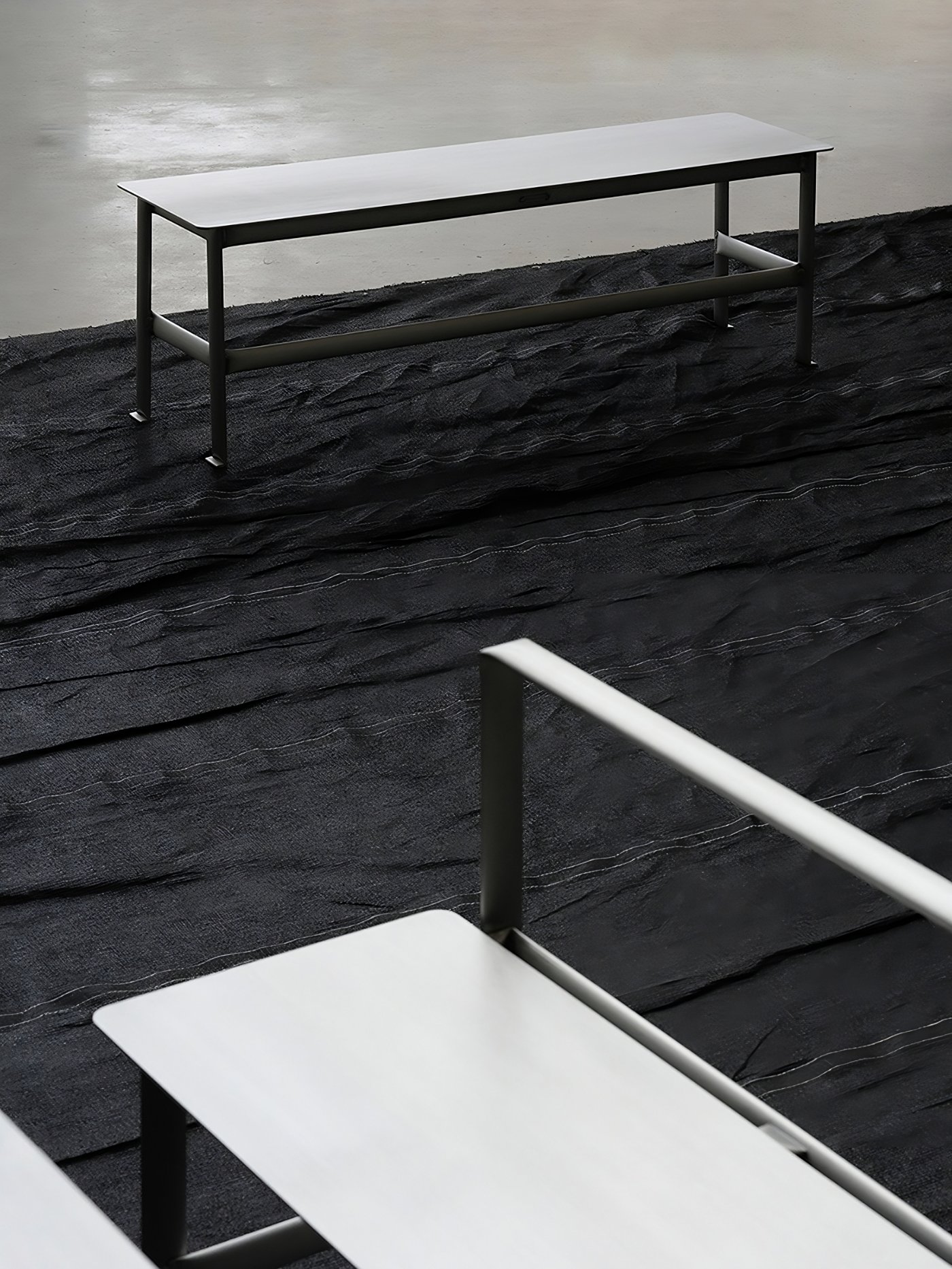 MONOCHROME by Ximi Li — MONOCHROME presents a series of minimalist furniture pieces constructed from folded and welded aluminum.