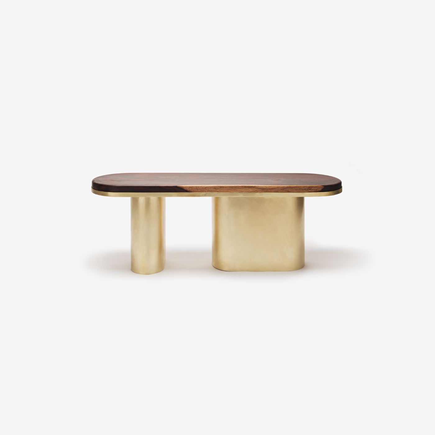 'Structure For Use' by Jeonghwa Seo — A sculptural dining table from Jeonghwa Seo's 'Structure For Use' series pairs a solid rosewood top with a brass-finished cast metal base.