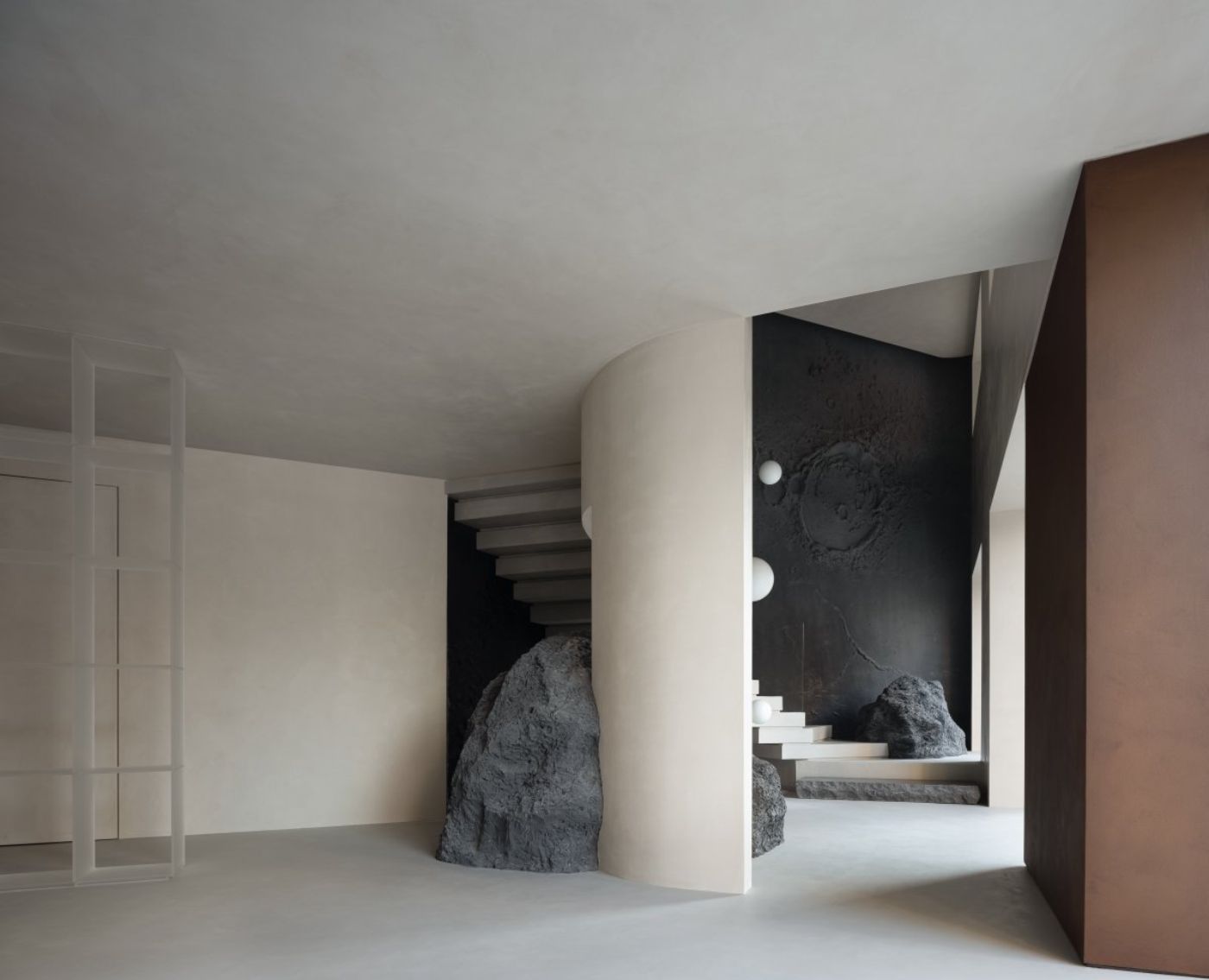 Novacolor Store by LICO Design — The Novacolor Store's entry passage presents a studied composition of material contrasts.