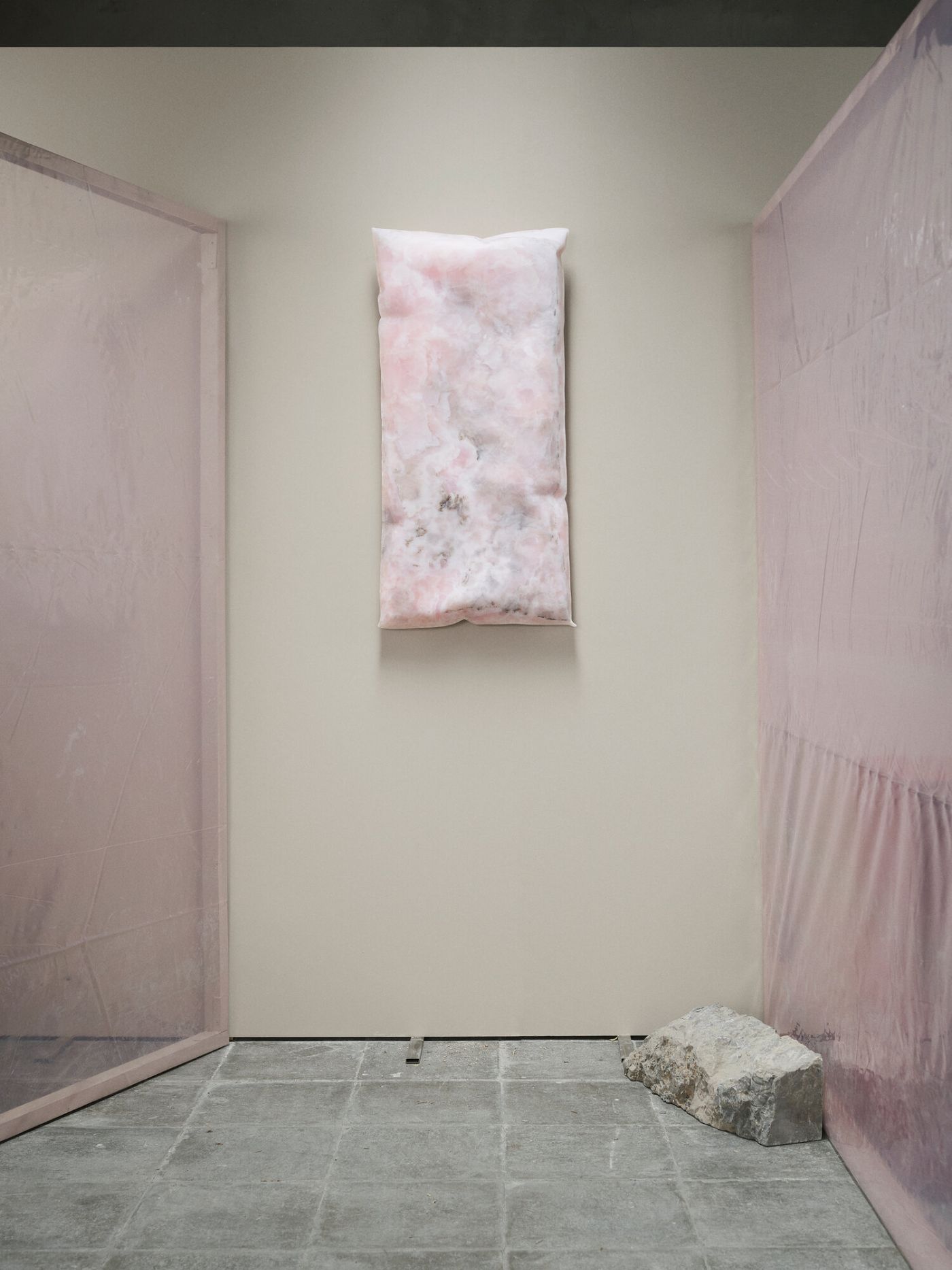 In Hale Wallpiece by Ben Storms — Ben Storms' In Hale wallpiece occupies a narrow gallery alcove defined by pink-toned plaster panels flanking a cream-colored wall.