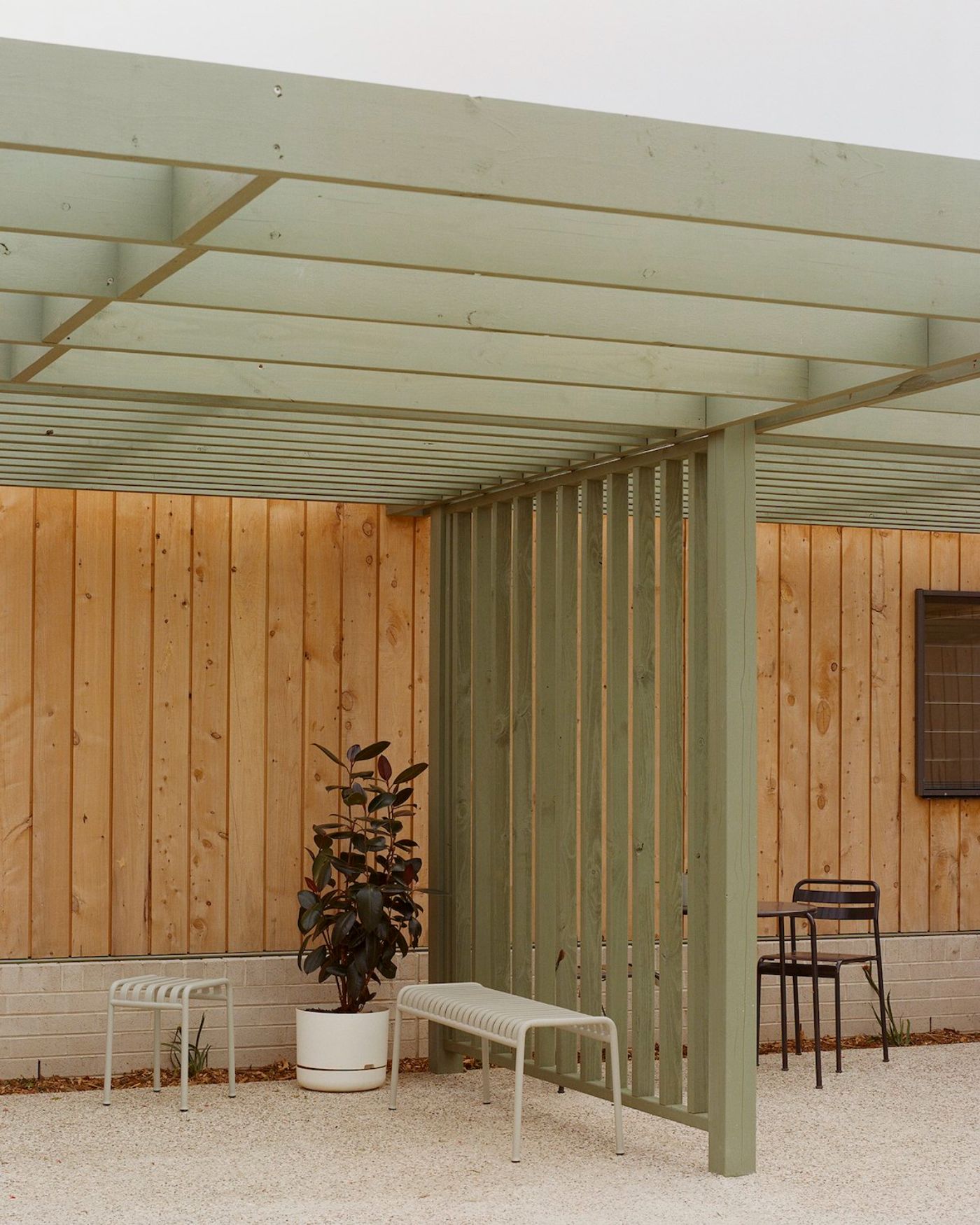 WPI Older Women’s Housing Project by Bright Studio by Studio Bright — A covered courtyard within the WPI housing project frames a threshold between interior and exterior spaces.