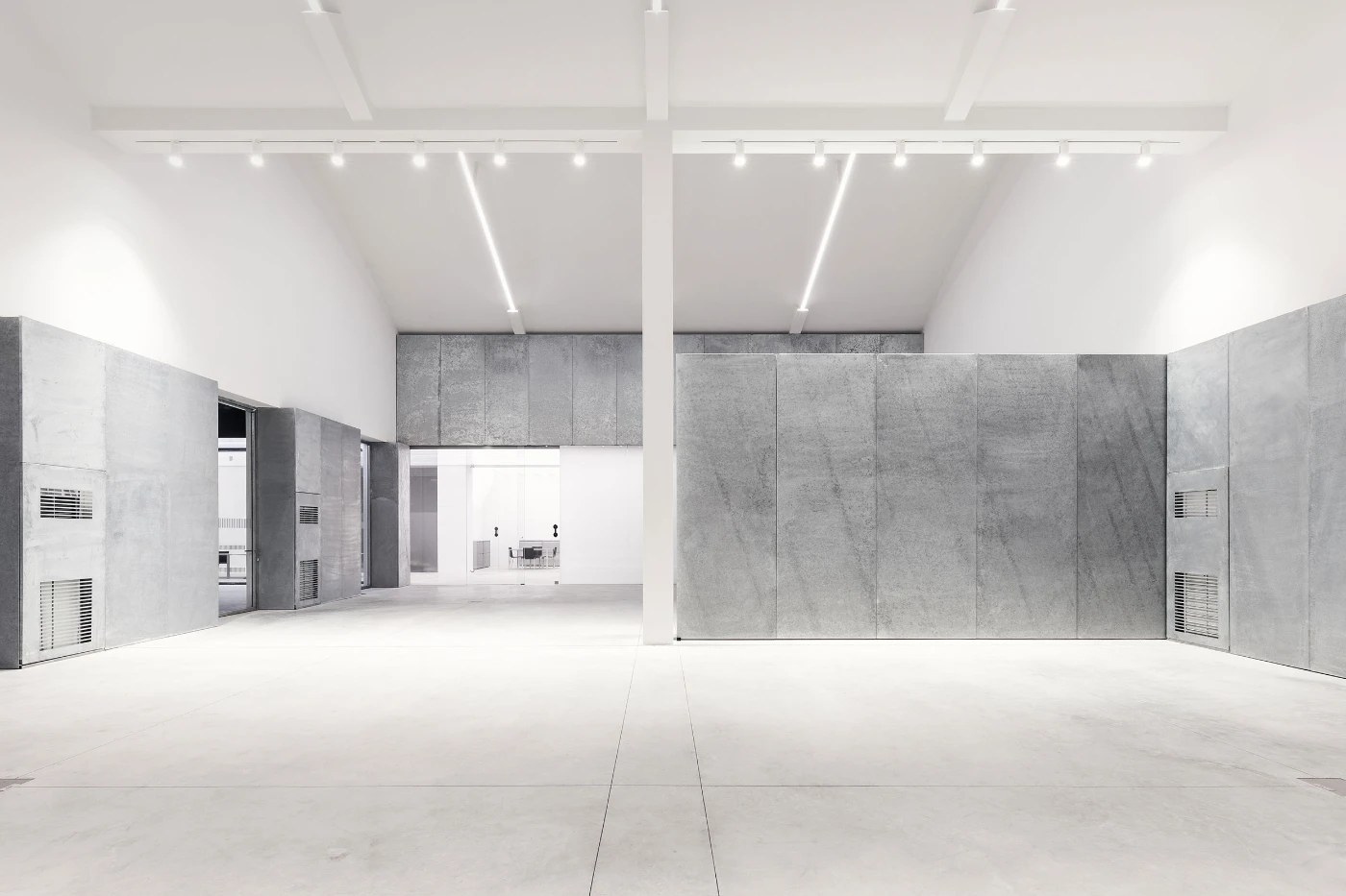 Spazio Maiocchi in Milan — A symmetrical view of Spazio Maiocchi's main gallery volume reveals a rigorous geometric interior.
