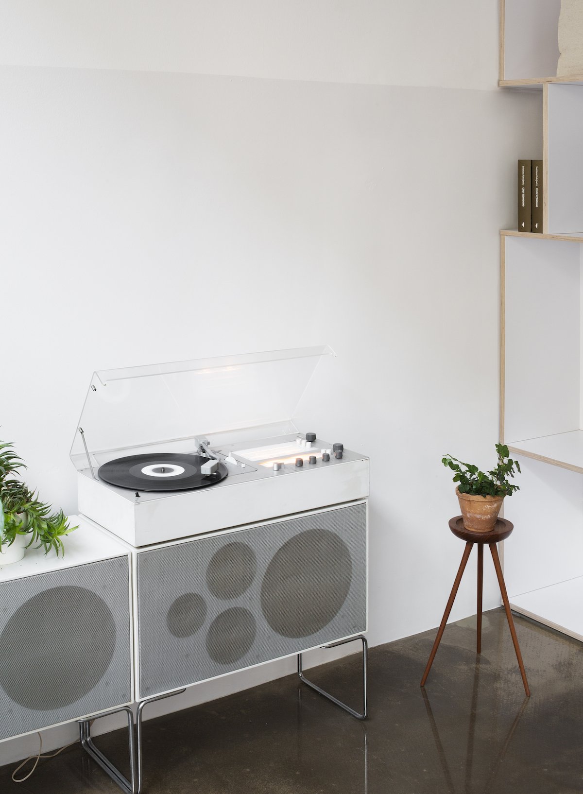 Thisispaper Warsaw Flagship Store by Thisispaper Studio — Detail view of the Thisispaper Warsaw flagship store's audio equipment station.