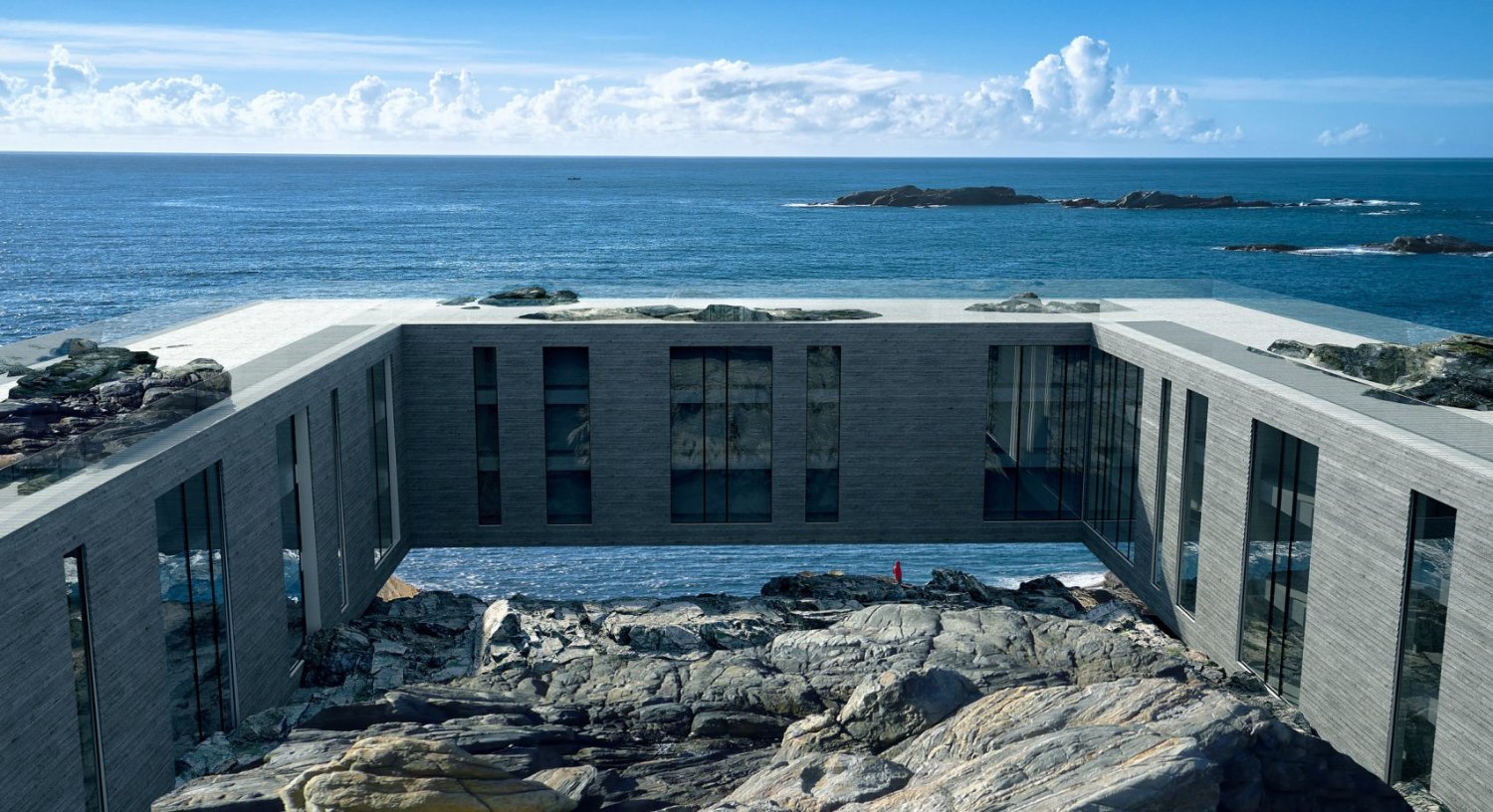 Fedje Hotel by Saunders Architecture — The Fedje Hotel's U-shaped concrete structure frames a tidal pool nestled within stratified basalt formations.