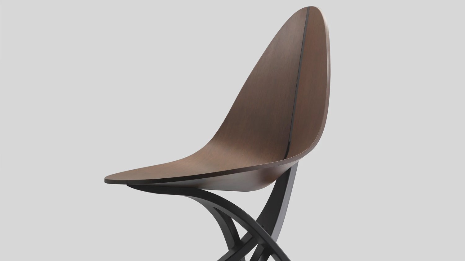 Edaha chair by GamFratesi for Koyori — The Edaha chair by GamFratesi is presented in side profile against a neutral ground, emphasizing its sculptural silhouette.
