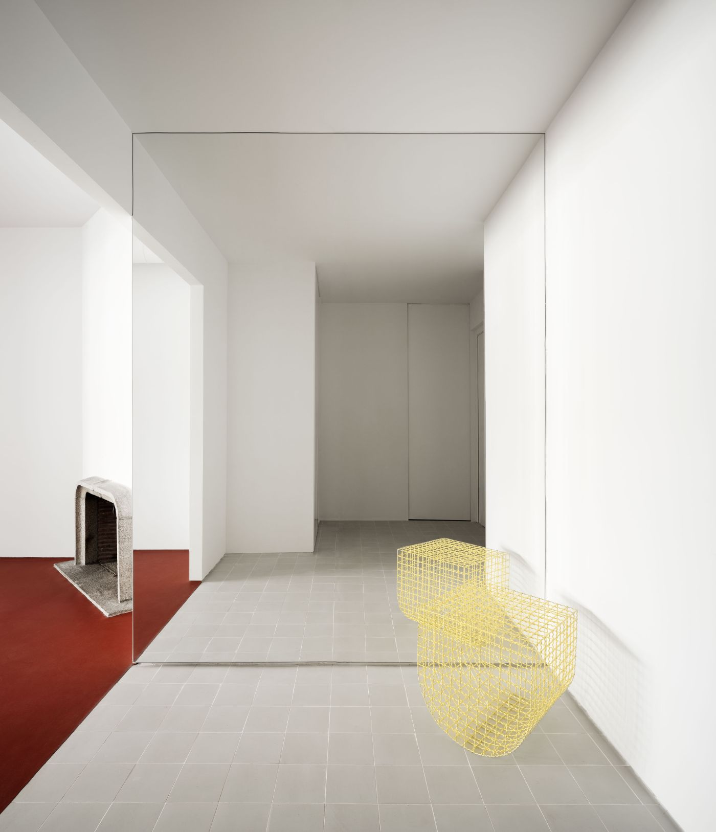 Lara House by HANGHAR — A corridor interior rendered in high-key white and gray tones, punctuated by two assertive chromatic interventions.