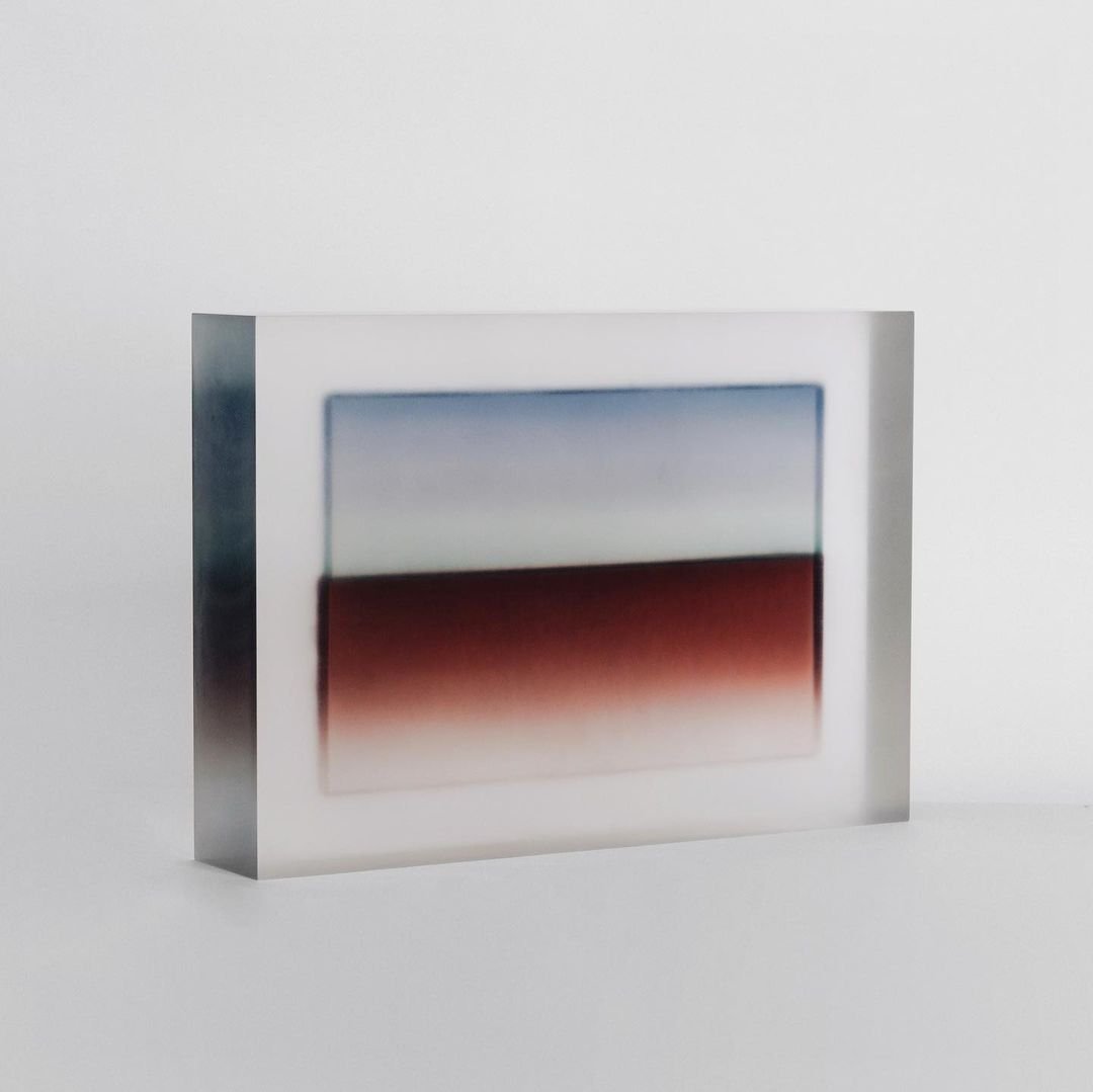 Block Series by Rahee Yoon — A rectangular acrylic block sculpture containing a horizontal gradient composition of deep burgundy fading to white, creating an internal color field...
