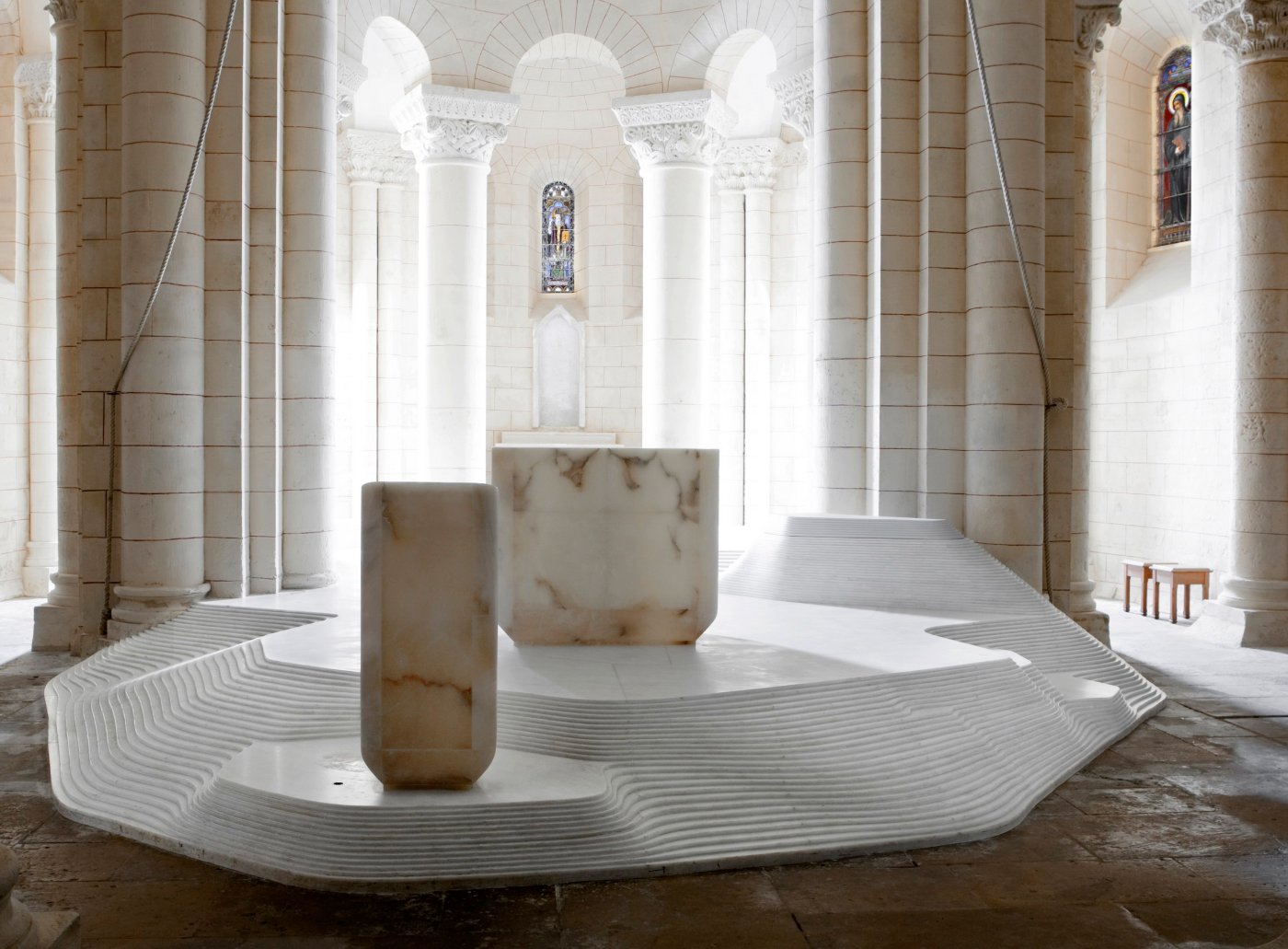 St Hilaire Church in Melle by Mathieu Lehanneur — Mathieu Lehanneur's intervention in the 12th-century St Hilaire Church manifests as a sculptural white marble installation anchoring the nave.