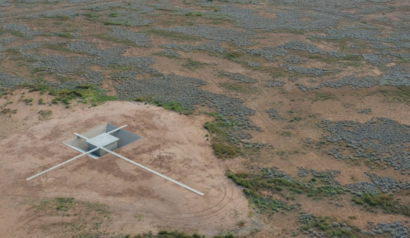 McNeal 020 Pavilion by Atelier David Telerman — Aerial view of McNeal 020 Pavilion situates the white concrete structure as a precise geometric intervention within Arizona's arid landscape.