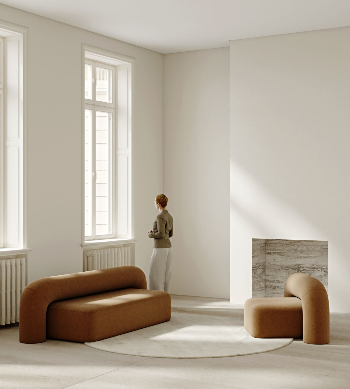 Moss Sofa collection by Pavel Vetrov Studio — The Moss Sofa collection is presented in a minimalist interior with two pieces arranged on a cream circular rug.