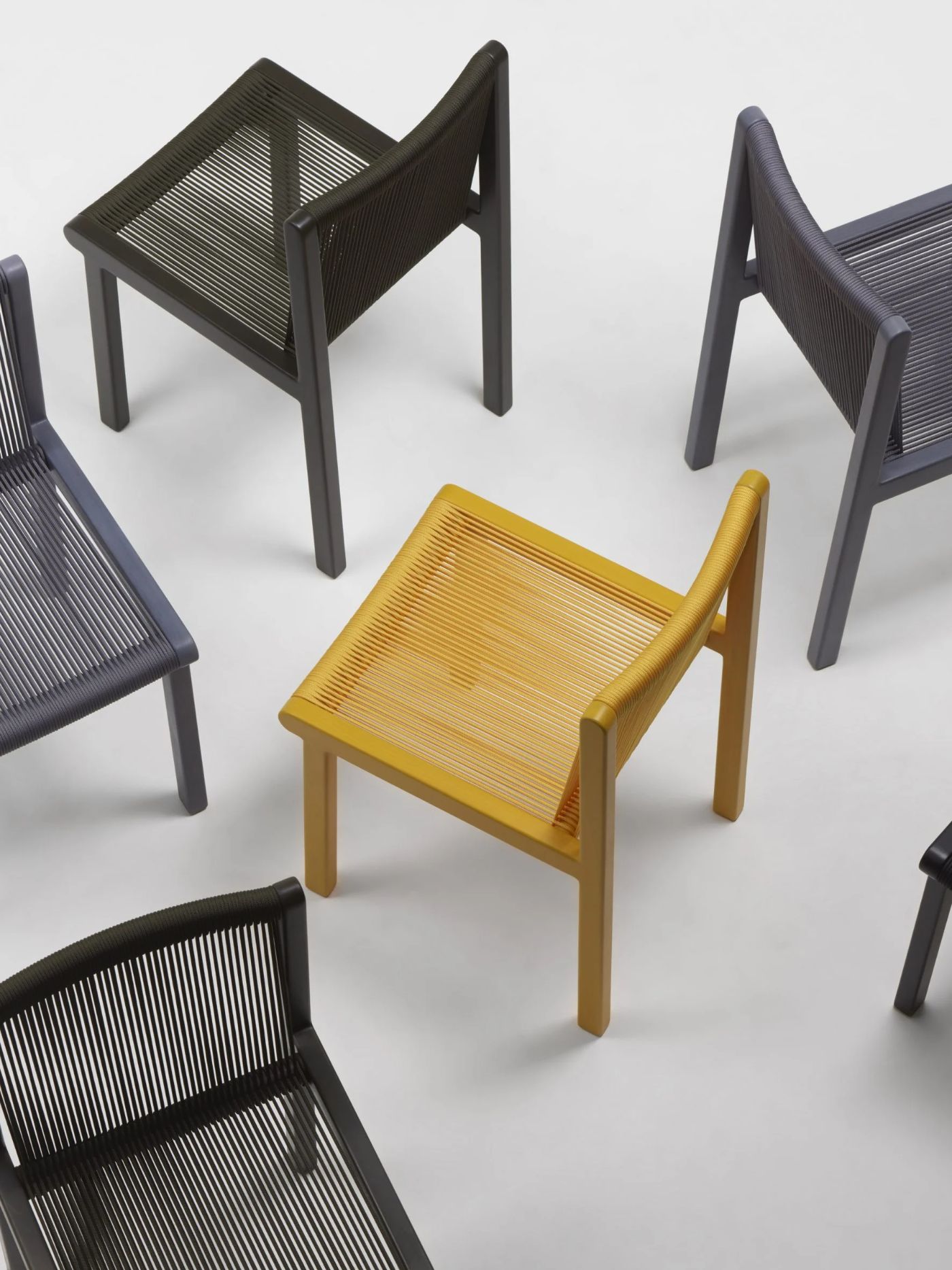 FILO CHAIR by Ronan & Erwan Bouroullec for Mattiazzi by Ronan and Erwan Bouroullec — The Filo chair series displays material and chromatic variety through four iterations arranged in isometric view.