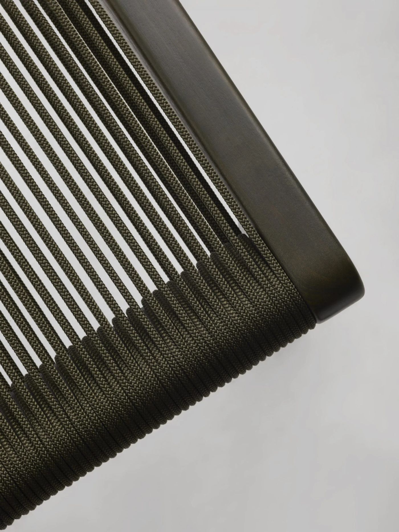 FILO CHAIR by Ronan & Erwan Bouroullec for Mattiazzi by Ronan and Erwan Bouroullec — Detail view of the Filo chair's backrest, showcasing the defining parallel fabric cord construction.