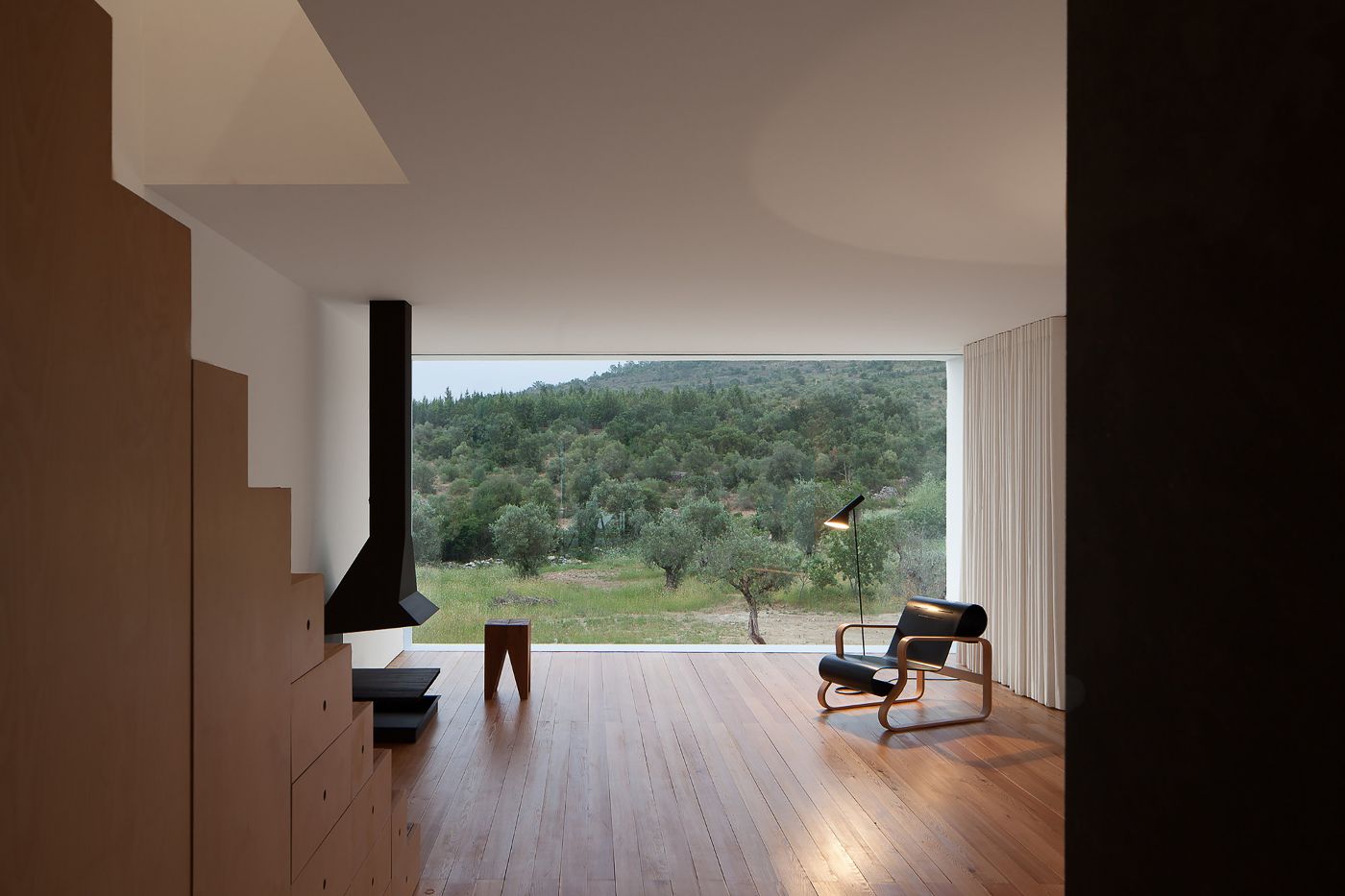 Fonte Boa House by João Mendes Ribeiro — Interior view of Fonte Boa House revealing the spatial relationship between built environment and landscape.