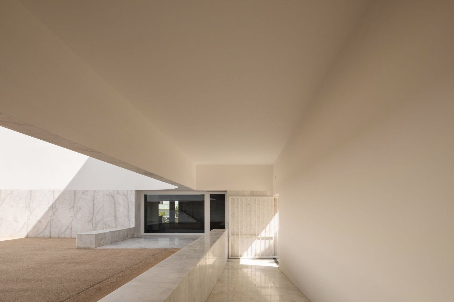 Grândola’s Library and Municipal Archive by Matos Gameiro Arquitectos + Pedro Domingos Arquitectos — The recessed entrance court of Grândola's Library anchors the municipal square through a severe geometric composition.
