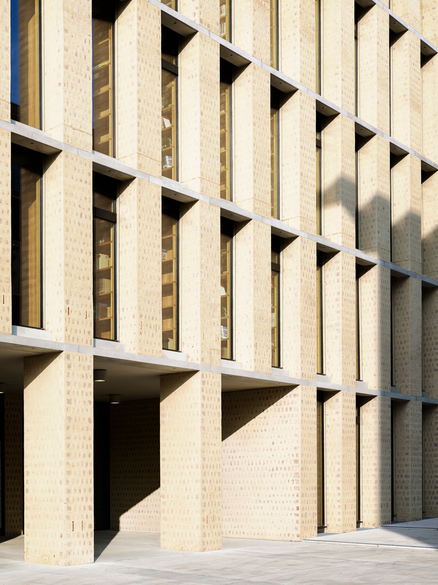 Philosophical Seminar at the Cathedral Square by Peter Böhm Architekten — The Philosophikum's ground-floor entrance threshold captures the project's material strategy at full scale.
