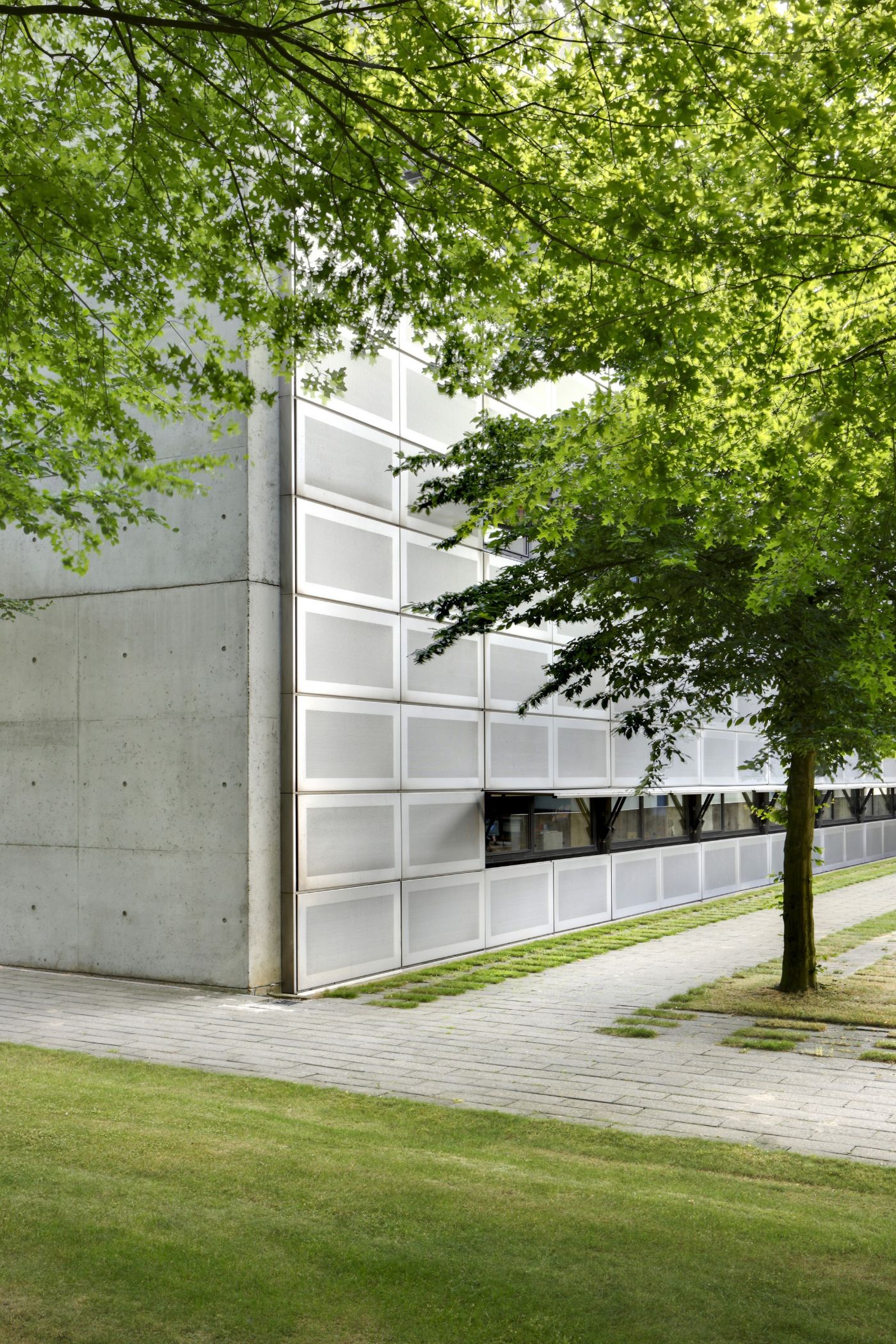 AZL Pension Fund Headquarters by Wiel Arets Architects by WAA Wiel Arets Architects — The AZL Pension Fund Headquarters presents a stark junction between interventionist modernism and industrial heritage.