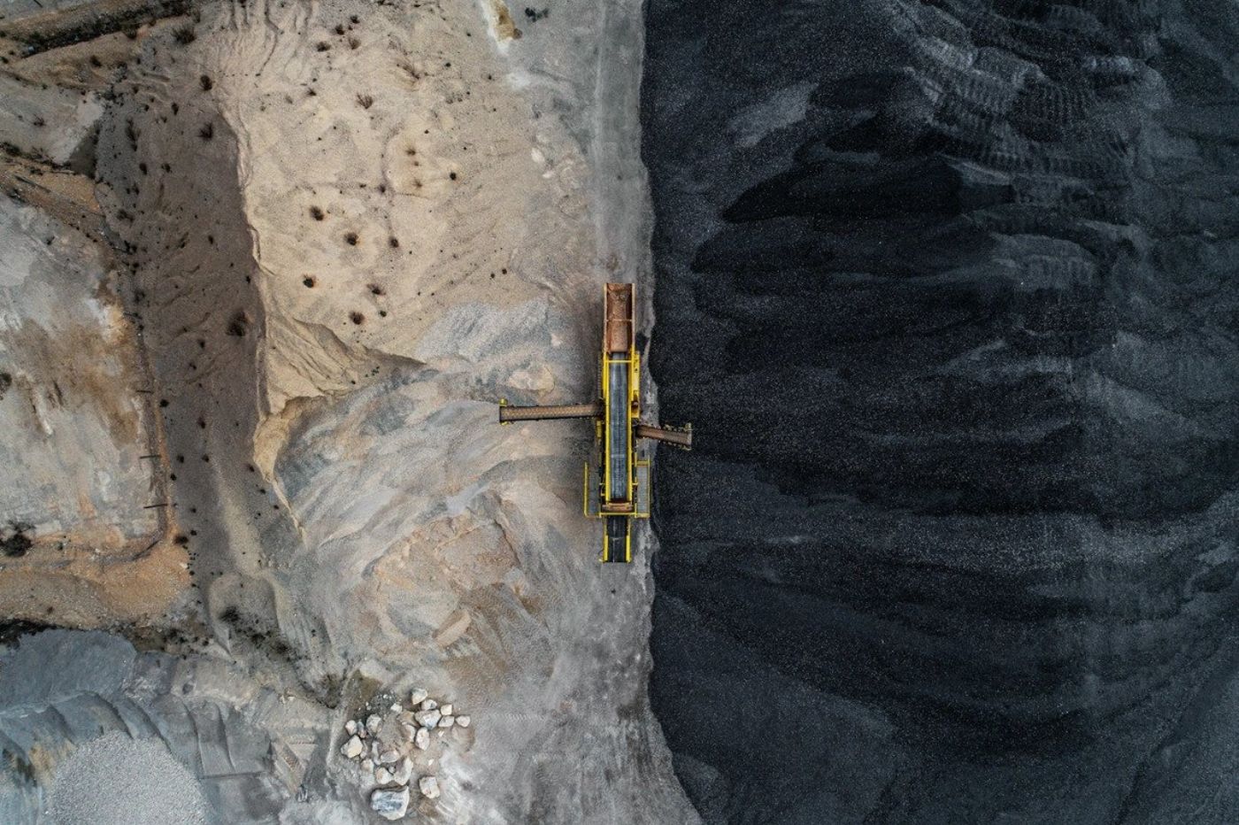 The Coal Mine Series by Tom Hegen — Aerial view of a lignite mining operation showing the stark demarcation between extraction and processing zones.