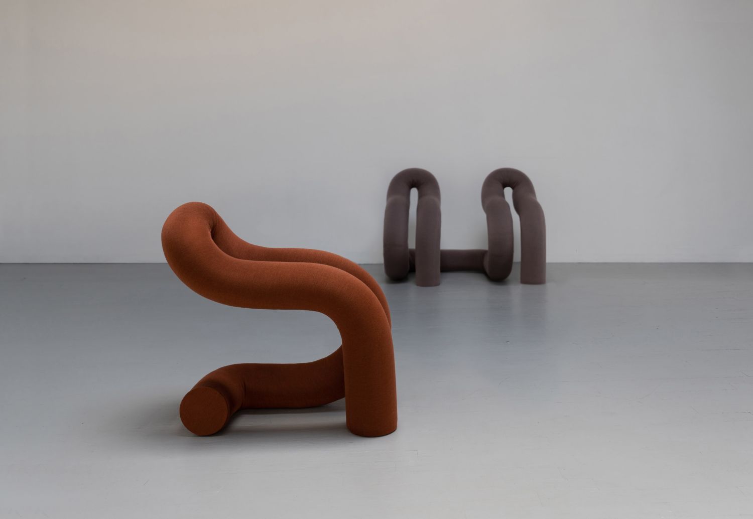 ULU Collection by Ara Thorose — Two sculptural furniture forms from the ULU Collection demonstrate contrasting approaches to curved geometry.