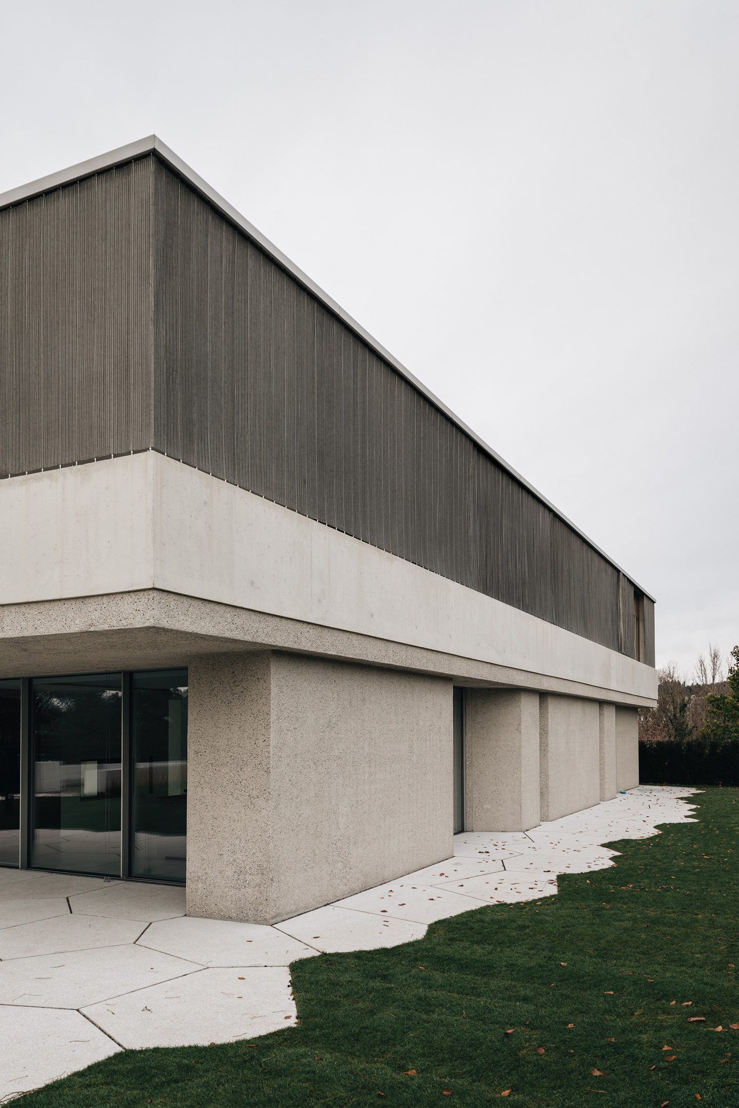 House for an Art Collector by Think Architecture — The south-facing facade reveals the material stratification of House for an Art Collector.