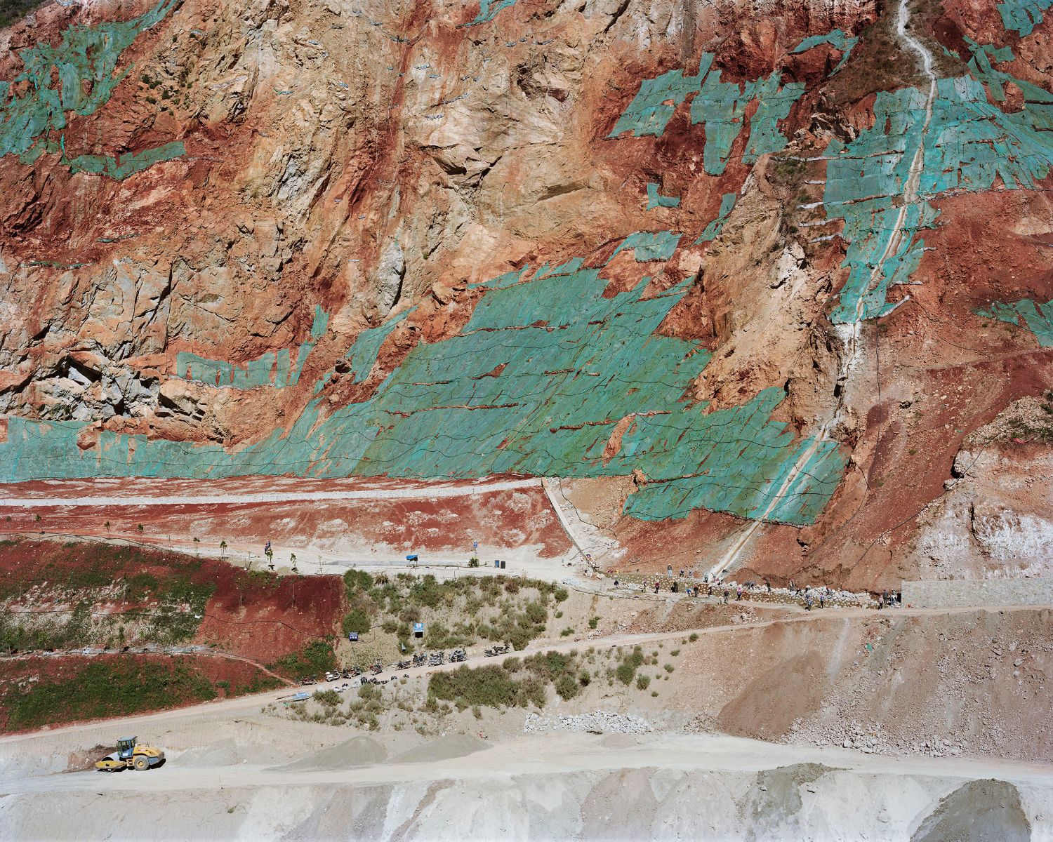 Forest by Yan Wang Preston — Aerial view of a quarry or mining site in Chongqing documents large-scale landscape transformation.