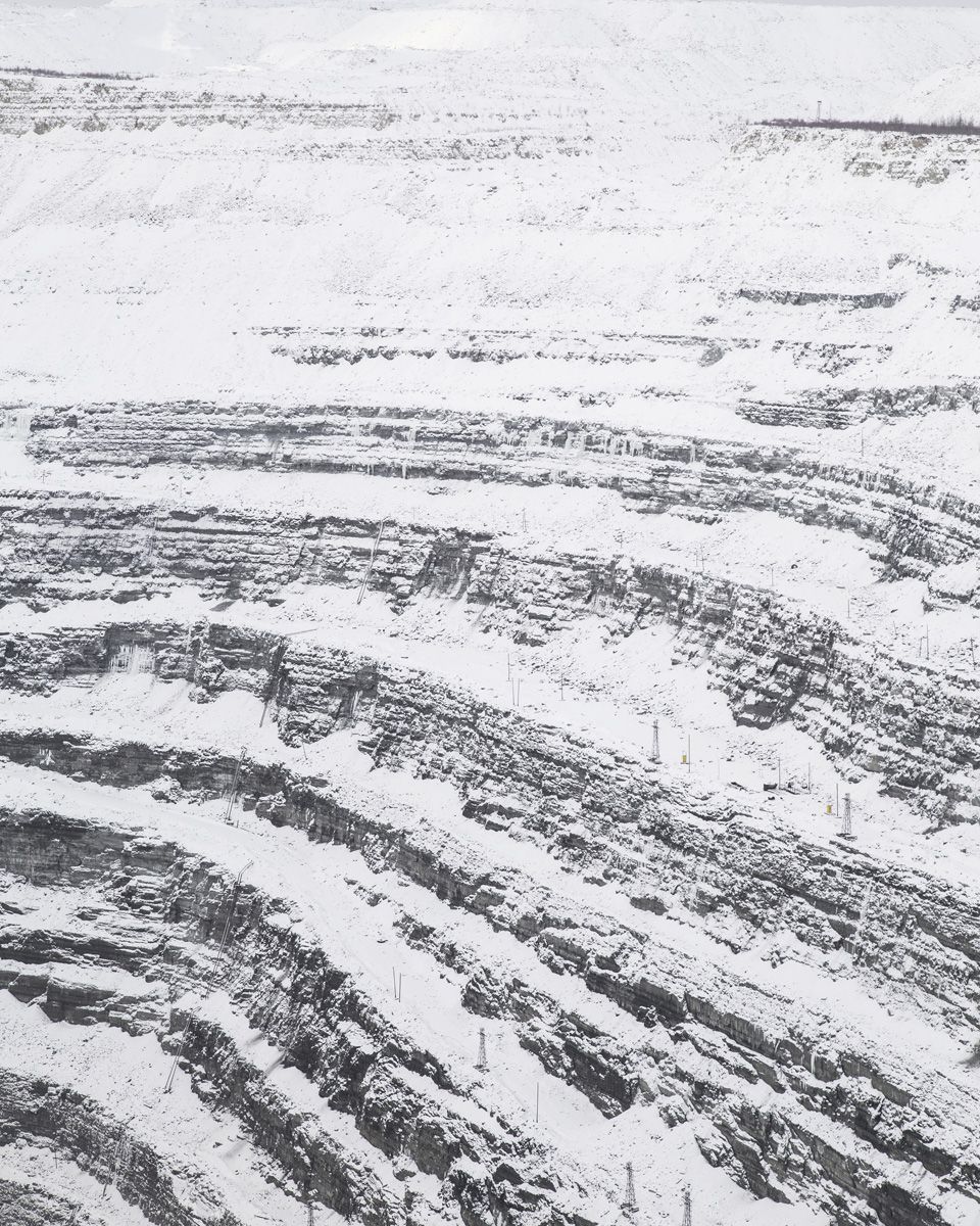 Удачный / Lucky by Hanne Van Assche — Aerial photograph of Udachny's mining landscape during winter.