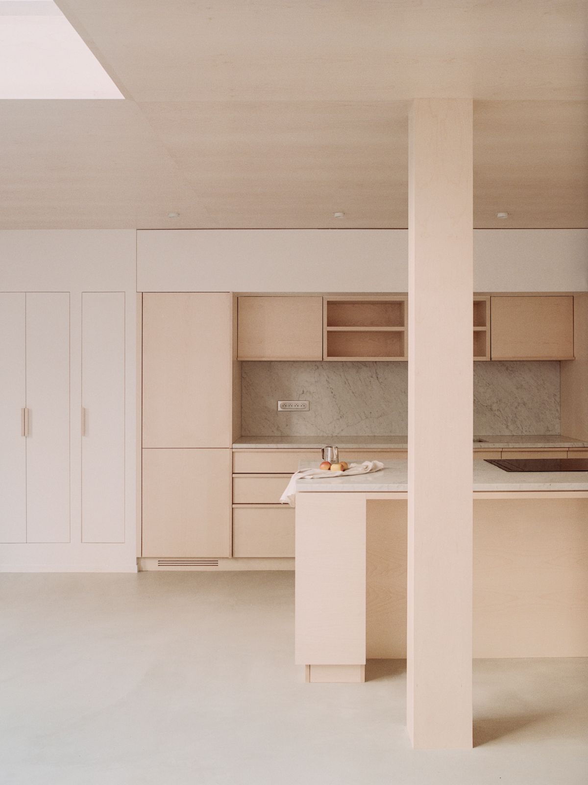 Jean Moulin Atelier – House by Atelier NEA — The kitchen intervention in Jean Moulin Atelier demonstrates spatial organization through material hierarchy and functional zones.