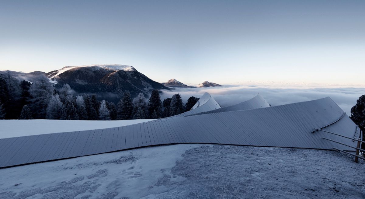 Oberholz Mountain Hut by Peter Pichler & Pavol Mikolajcak by Peter Pichler Architecture — The three staggered pavilions of Oberholz Mountain Hut recede into the alpine landscape, their dark timber frames and white panel infill creating sharp...