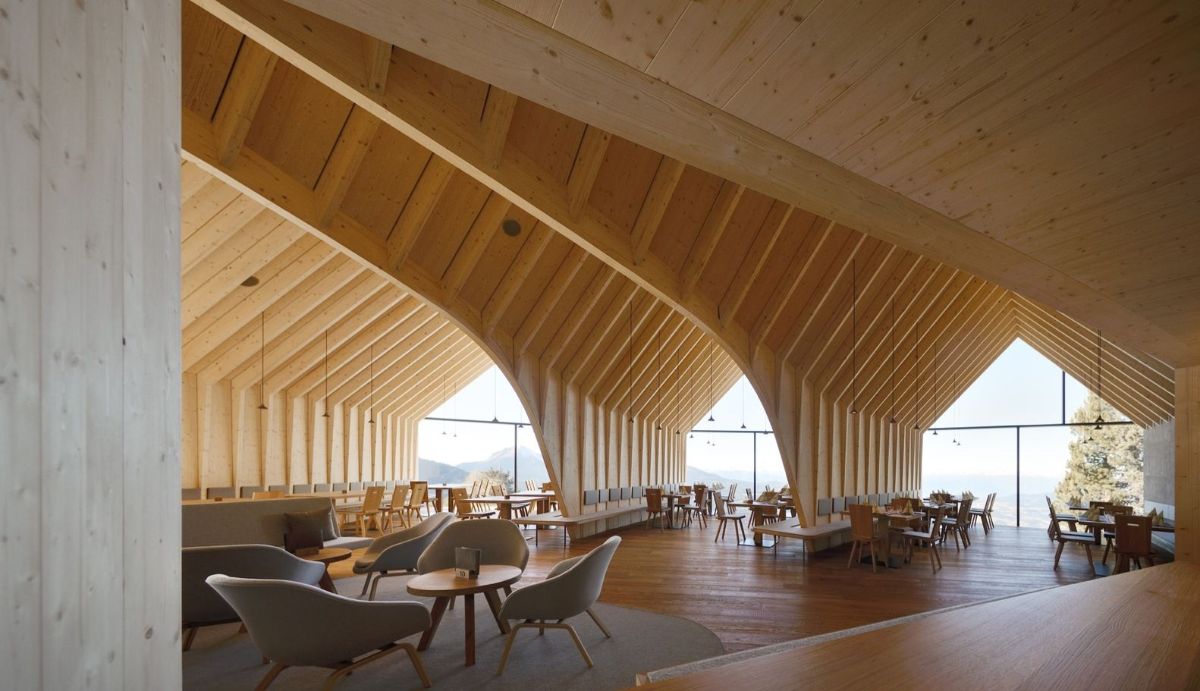 Oberholz Mountain Hut by Peter Pichler & Pavol Mikolajcak by Peter Pichler Architecture — Interior view of the Oberholz Mountain Hut revealing the spatial strategy of three staggered pavilions unified through a continuous timber-lined volume.