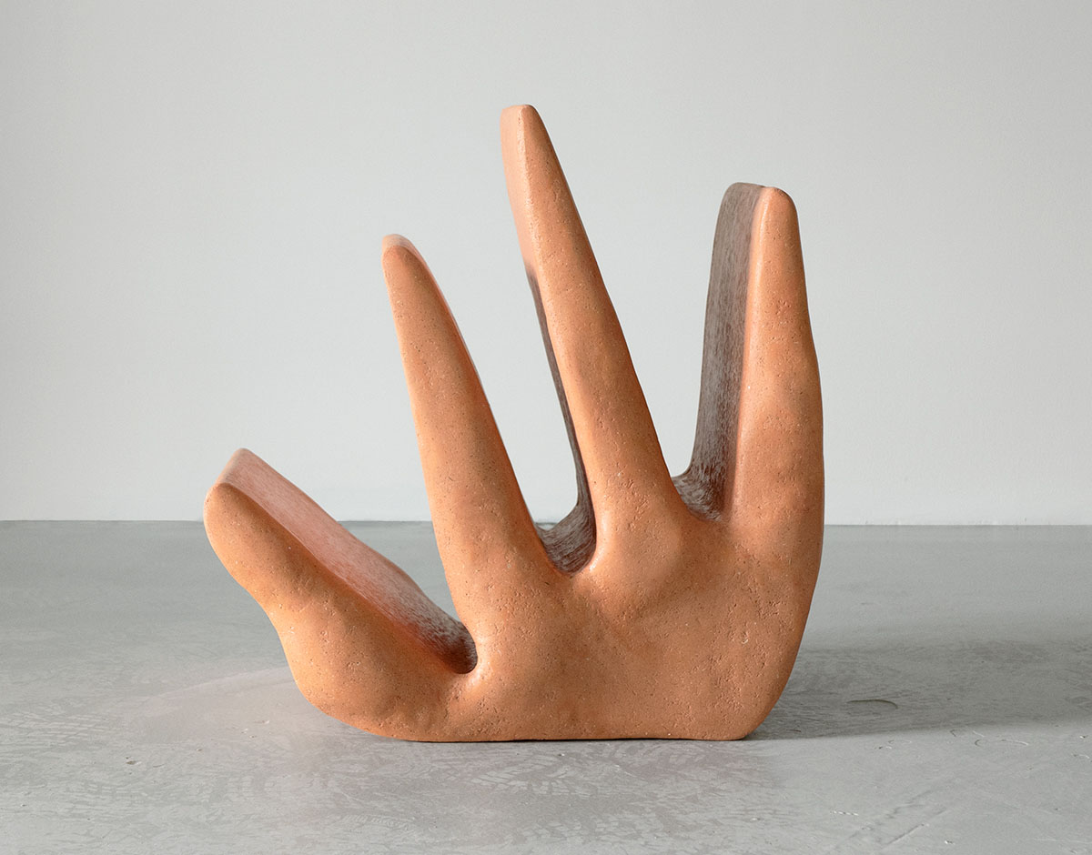 Roommates by Barbora Žilinskaite — Hand-sculpted terracotta form featuring an anthropomorphic torso with four tapered columnar legs extending downward.