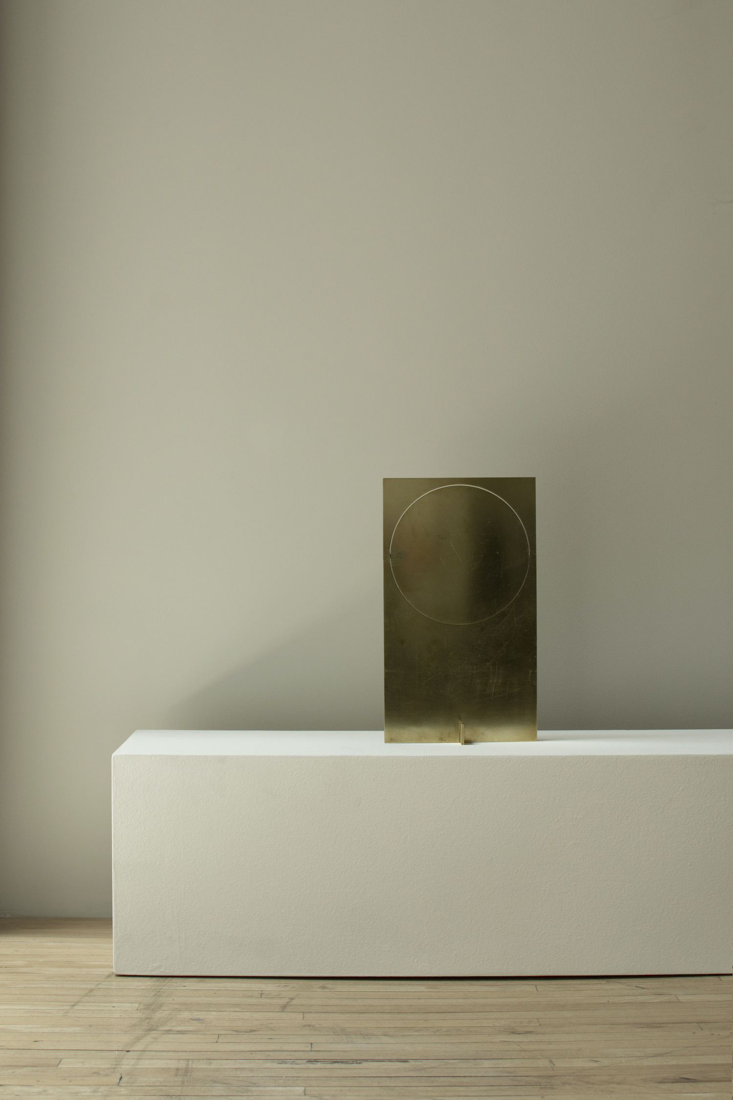 OBJ-01 by Manu Bañó — OBJ-01 mounted on a white plinth, positioned against a neutral wall.