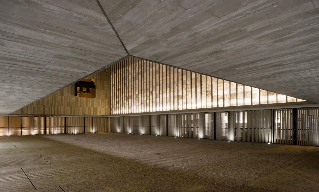 San Jorge Church by Tabuenca & Leache — Interior view of the San Jorge Church revealing the structural logic of its timber-clad envelope.