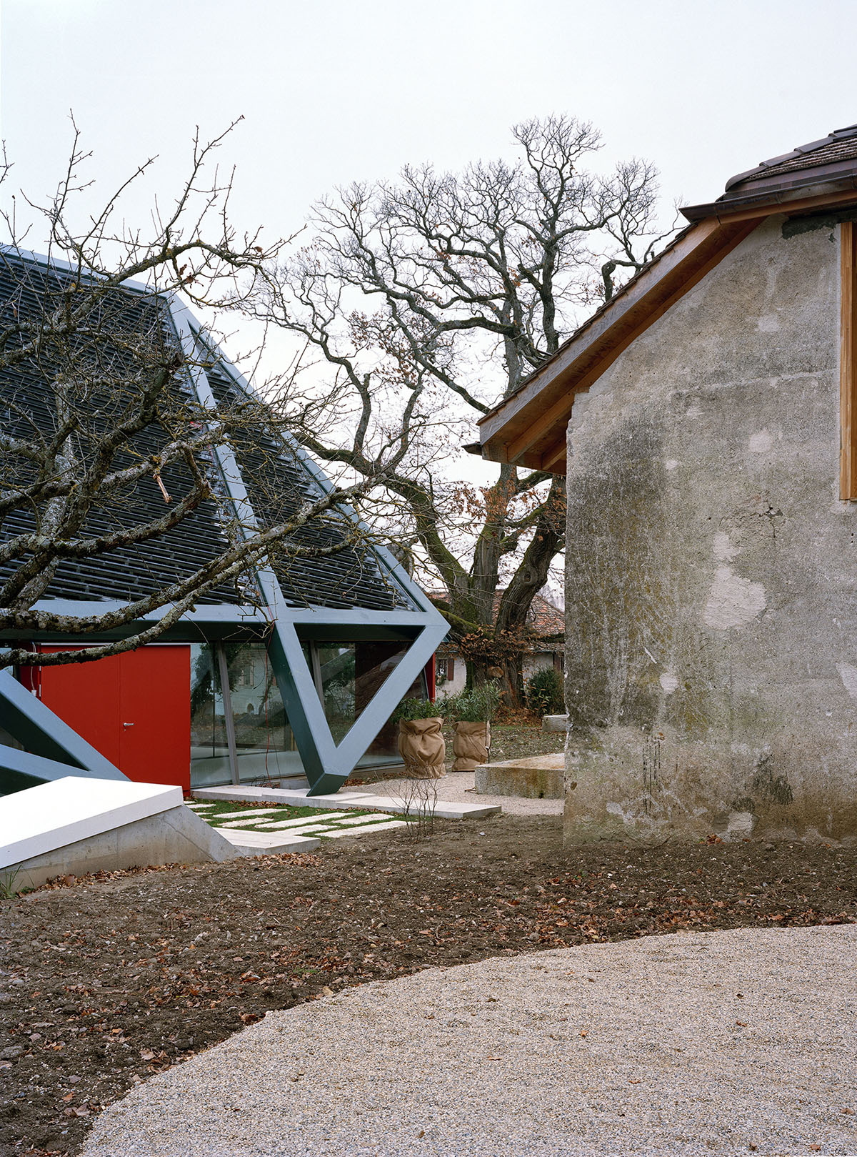 2 Houses in Chigny by Dieterdietz.org — A transitional courtyard space frames the dialogue between heritage and contemporary intervention.