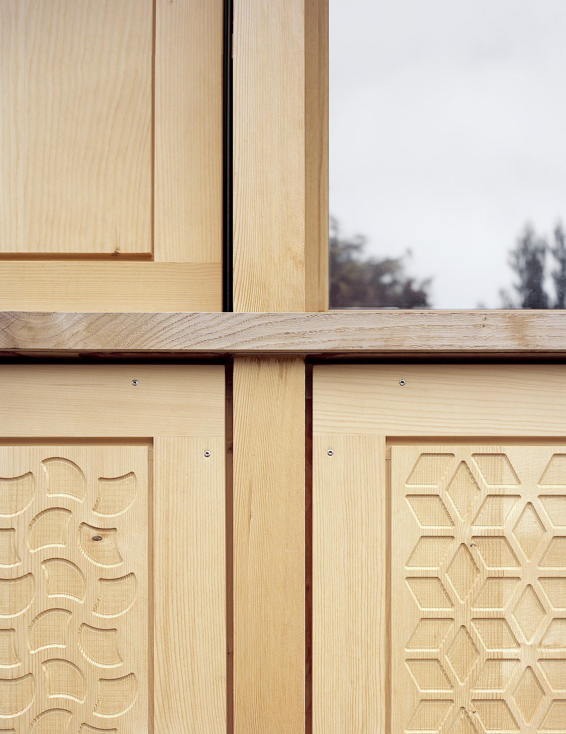 House K Alpnach by Seilerlinhart — Detailed view of House K's timber facade reveals the construction logic underlying its contemporary Alpine expression.