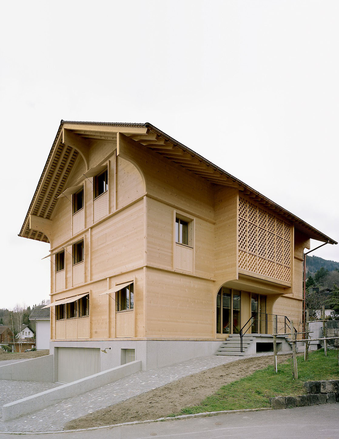 House K Alpnach by Seilerlinhart — House K Alpnach demonstrates a contemporary reinterpretation of regional timber construction through deliberate formal gestures.