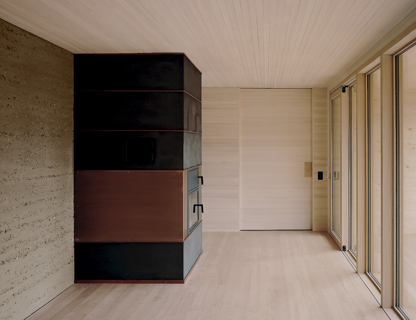 House K Alpnach by Seilerlinhart — Interior passage of House K reveals the timber construction company's contemporary interpretation of Alpine building traditions.