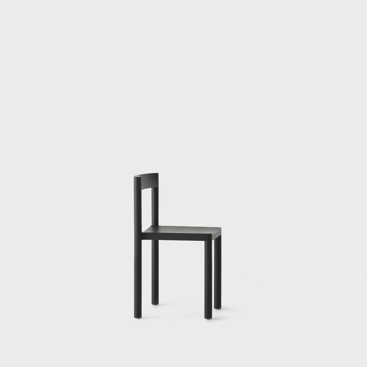 Pier Chair by Leonard Kadid — Leonard Kadid's Pier Chair, photographed in profile against a neutral ground, reveals its structural logic through visual transparency.