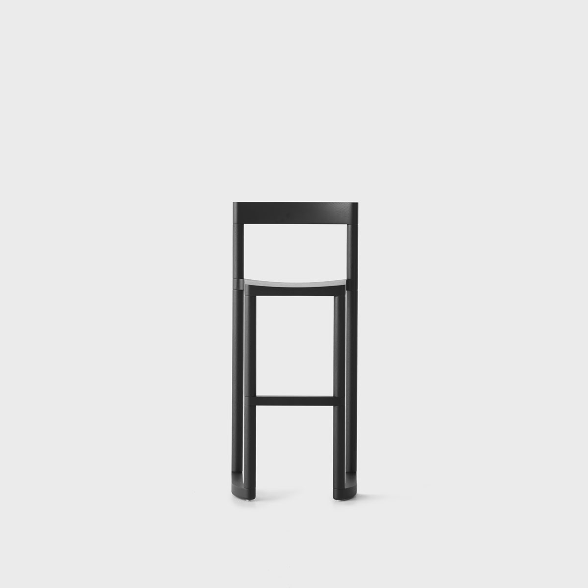 Pier Chair by Leonard Kadid — The Pier Chair by Leonard Kadid is photographed frontally against a neutral ground, revealing its skeletal frame construction.