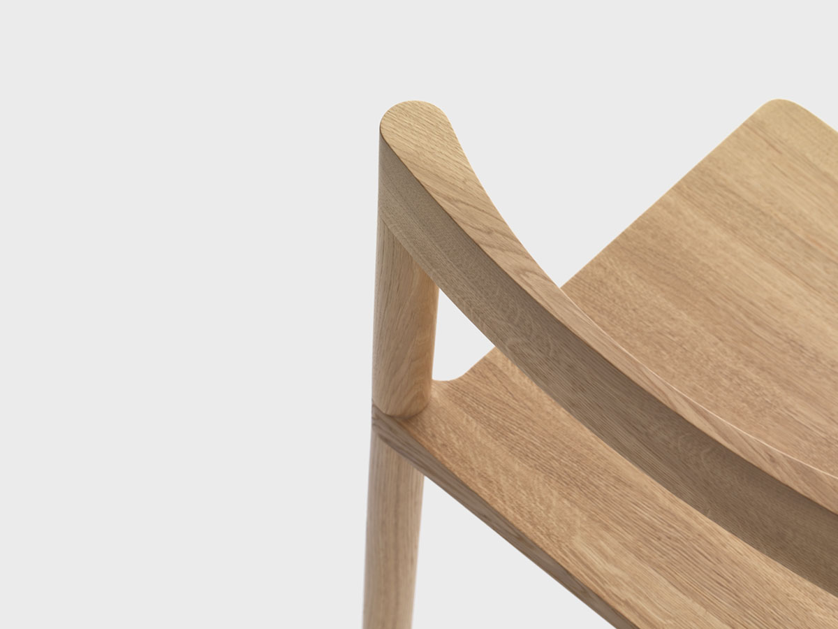 Pier Chair by Leonard Kadid — Close-up detail of the Pier Chair's joinery and curved backrest.