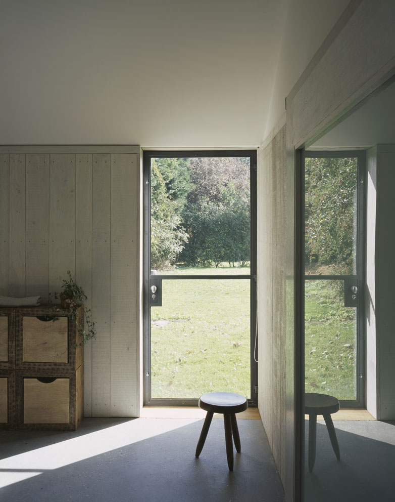 Stable Acre House by David Kohn — Interior threshold framing the south-western landscape beyond.