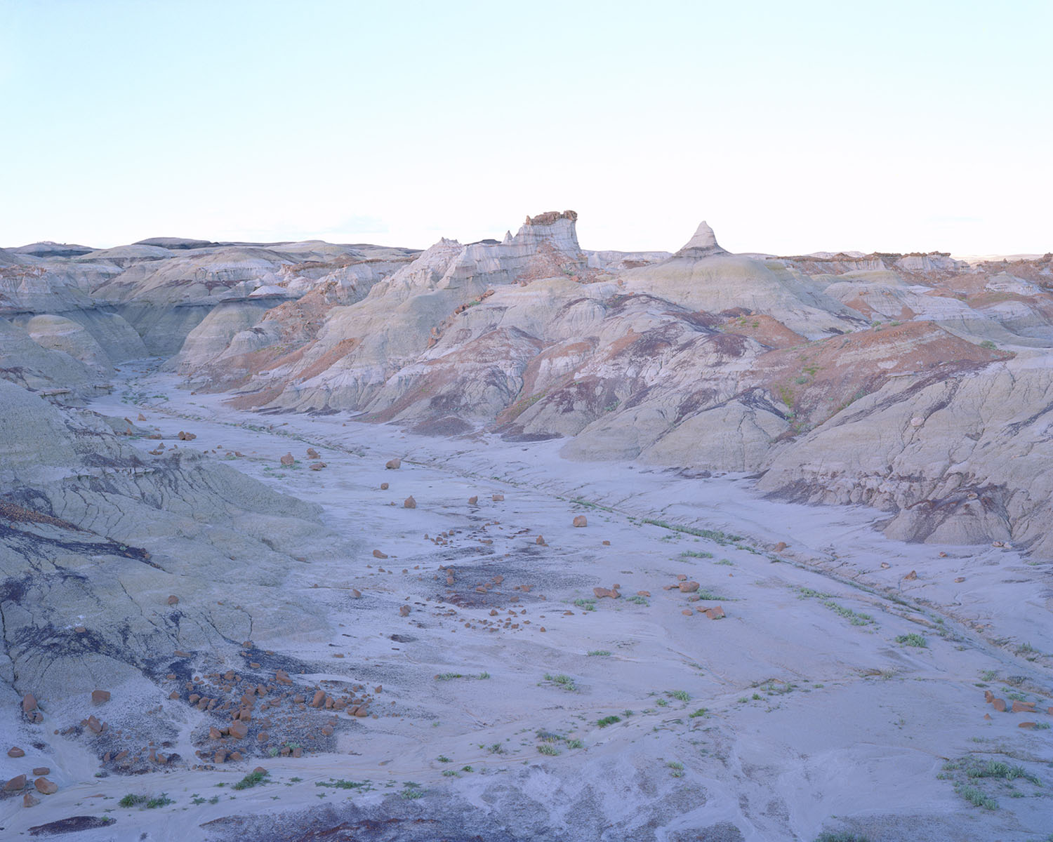 Breathtaking Landscapes by Luca Tombolini — Layered rhyolite ridge formations dominate this landscape photograph, their parallel striations angled diagonally across the mountainside.