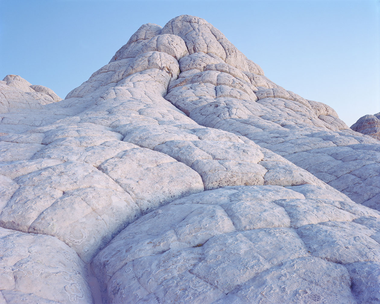 Breathtaking Landscapes by Luca Tombolini — Monolithic granite formation with pronounced exfoliation patterns creating rounded, stacked boulder morphology.