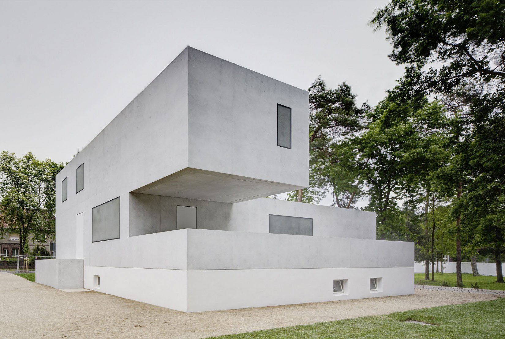 Neue Meisterhäuser Bauhaus Dessau by Bruno Fioretti Marquez — Bruno Fioretti Marquez's reinterpretation of the Bauhaus masters' houses demonstrates a contemporary approach to historical reconstruction through...