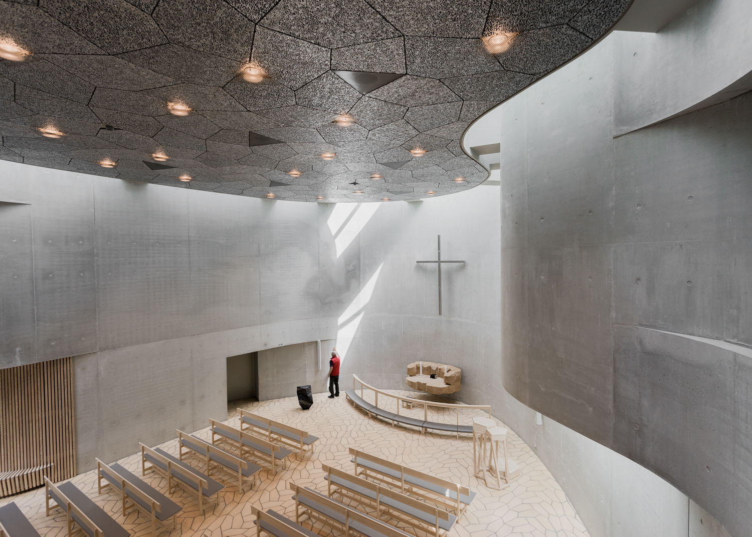 Trekroner Church by Rørbæk and Møller — Interior view of Trekroner Church's main worship space, photographed from an elevated position.