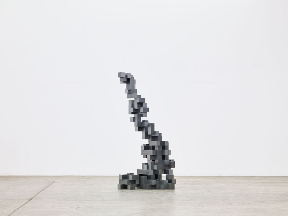 Sculptures by Antony Gormley — A timber block sculpture by Antony Gormley constructed from rectangular wooden elements of varying sizes stacked to approximate human form.