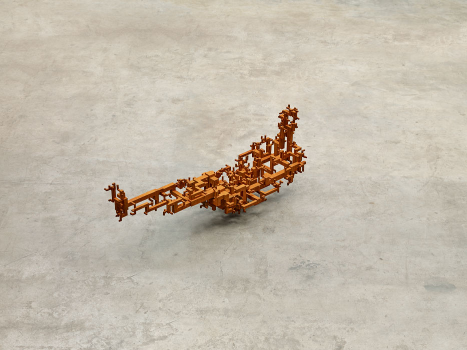 Sculptures by Antony Gormley — Timber sculpture constructed from rectangular wooden blocks assembled in a horizontal orientation, suggesting a prone or recumbent figure.