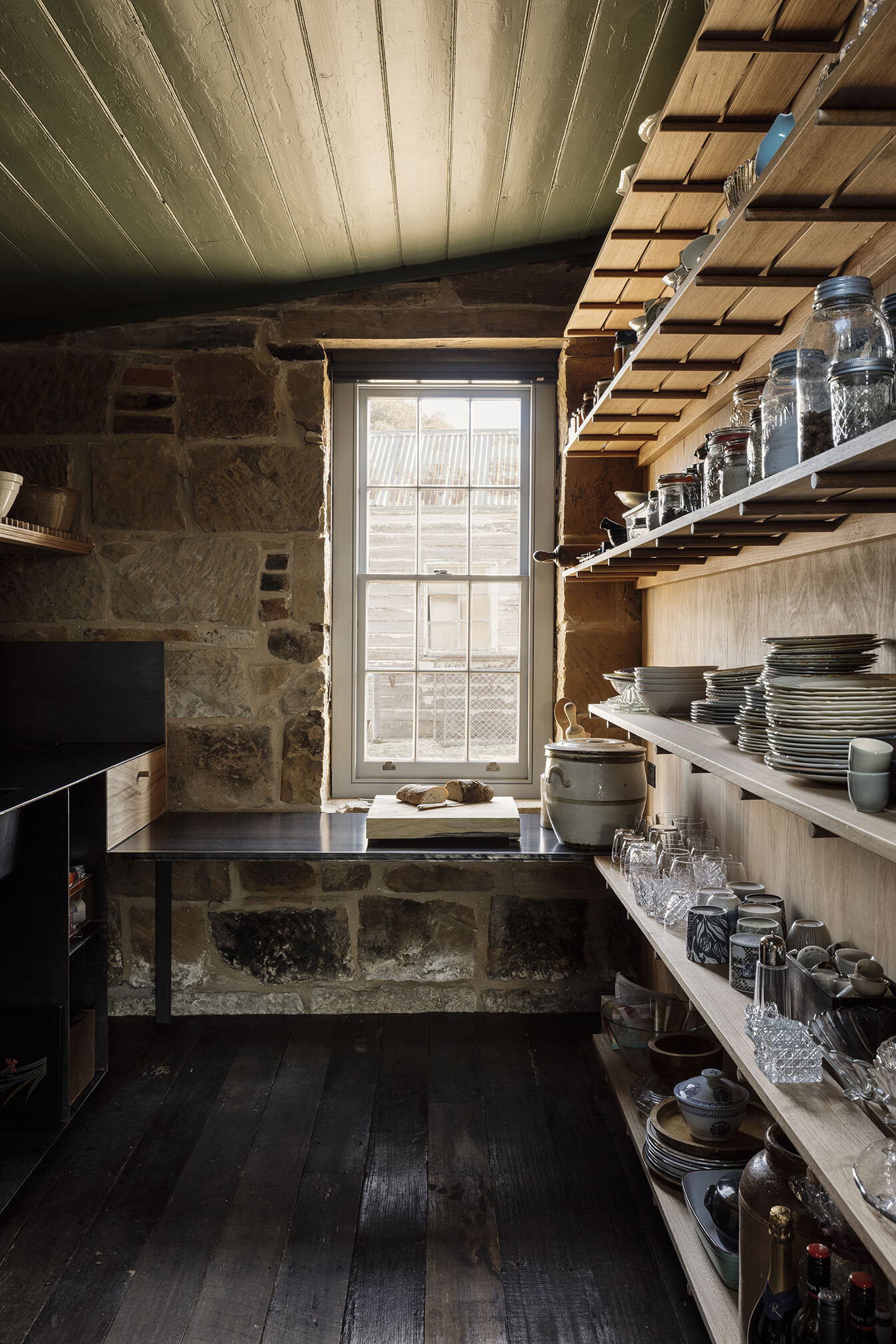 Bozen's Cottage by Taylor + Hinds Architects — A restored kitchen interior demonstrating post-restoration craft interventions within a Georgian cottage.